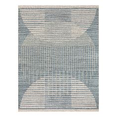 a blue and white rug with lines on the bottom, in different shades of grey