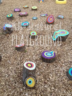 there are many different colored circles on the ground with words above them that read, when nature is playground