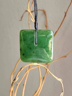 Canadian Jade Square Jade Pendant. Measures approximately 30mm on an adjustable wax cord Comes with or without our handcrafted wooden gift box Artisan Jewelry With Adjustable Cord As Gift, Artisan Jewelry With Waxed Cord For Gifts, Unique Waxed Cord Necklace As Gift, Minimalist Waxed Cord Jewelry As Gift, Handmade Square Jewelry As Gift, Handmade Square Jewelry Gift, Artisan Adjustable Rectangular Necklace, Artisan Rectangular Adjustable Necklace, Rectangular Artisan Jewelry Gift