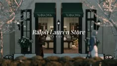 a store front with the words rapph lauren store on it's glass doors