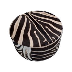 a black and white zebra print hat on a white background