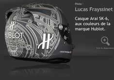 a black and white motorcycle helmet with the words hublot written on it's side