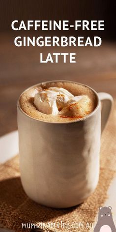 there is a cup of coffee with whipped cream in it and the caption reads caffeine - free gingerbread latte