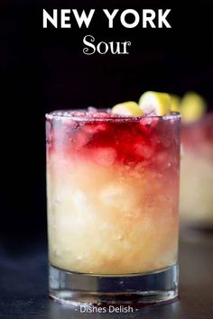 a close up of a drink in a glass on a table