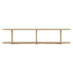 a wooden shelf sitting on top of a white wall in front of a white background