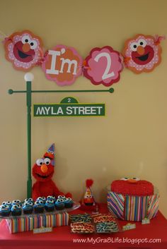 the sesame street birthday party is complete with cupcakes, cookies and cake decorations