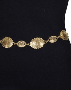 Catch the bohemian spirit and Southern California essence with our "Sunset Serenade Chain Belt." This piece is the perfect addition to take your outfit from simple to stunning with a nod to vintage charm. Fit: Adjustable chain for a customizable waist fit Style: Vintage-inspired, antique gold-tone conchos Occasion: Perfect for jazzing up a casual day look or adding flair to evening attire Styling Suggestions: Layer over a flowing maxi dress or cinch a billowy blouse for an effortlessly chic silh Bohemian Gold Chain Belt, Bohemian Gold Chain Belt With Adjustable Chain, Adjustable Vintage Chain Belt, Vintage Gold Chain Belt For Festivals, Adjustable Bohemian Gold Chain Belt, Adjustable Gold Bohemian Chain Belt, Gold Chain Belt For Beach, Gold Chain Belt For Summer Festival, Bohemian Adjustable Chain Belt As A Gift