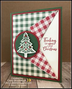 a card with a christmas tree on it