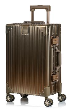 This lightweight aluminum suitcase is the ideal travel companion thanks to the water-resistant shell, TSA-approved locks and 360-degree spinner wheels. 21" x 13.5" x 9" Waterproof TSA-approved combination locks Telescopic top handle, top and side flat handles Double 360-degree spinner wheels Interior has compression system and clip-in pocketed panel with zippered compartments Aluminum Lined Imported Aluminum Suitcase, Metal Suitcase, Luxury Travel Bags, Travel Luggage Set, Cross Country Road Trip, 2024 Year, Spinner Suitcase, Pack Light, Solo Trip