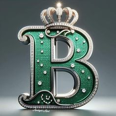 the letter b is made up of diamonds and emerald green letters with crowns on top