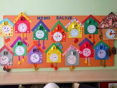 there are many clocks on the wall and one is for children to tell time in