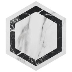 a marble hexagonal frame with black and white lines in the center on a white background