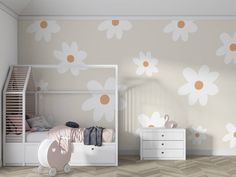 a child's bedroom with white furniture and flowers on the wall