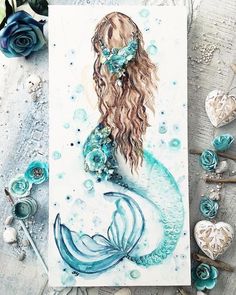 a drawing of a mermaid with long hair and flowers on it's head, sitting next to seashells