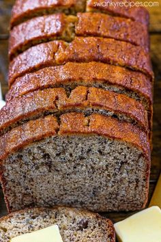 sliced loaf of banana bread with butter on top