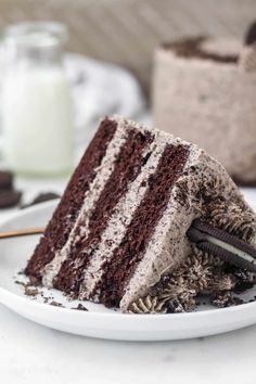 a slice of chocolate cake on a white plate