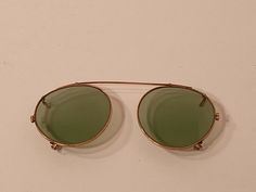 Vintage Clip On Sunglasses. Gold color frame green lenses Color Frame, Green Lenses, Clip On Sunglasses, Vintage Clip, Clip On, Mirrored Sunglasses, Gold Color, Lenses, Sunglasses