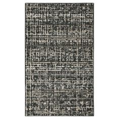 a black and white rug on a white background