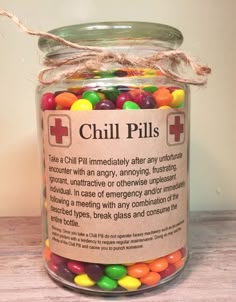 a jar filled with lots of colorful candy