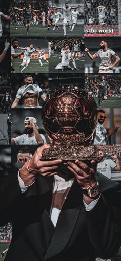 a man holding up a trophy in front of his face with many pictures behind him