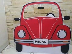 an image of a red car with the word pedro on it's front