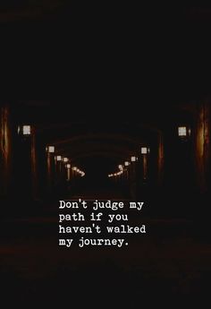 a dark tunnel with the words don't judge my path if you haven't walked