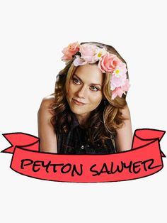 a woman with flowers in her hair and the words petton salmer on it