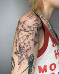 a woman with a tattoo on her arm