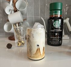 starbucks iced coffee is sitting on the kitchen counter