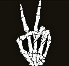 a hand making the v sign with its fingers in black and white ink on a dark background