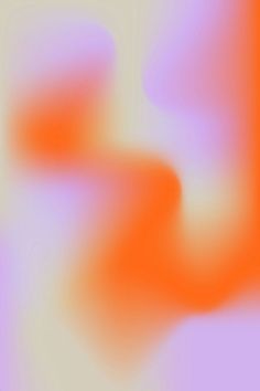 blurry image of an orange and pink background