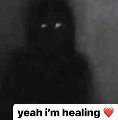 a person in a black hoodie with the caption yeah i'm healing