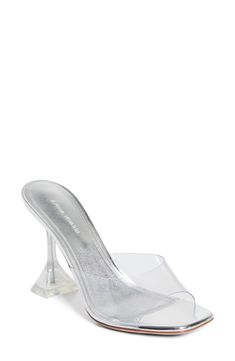 Amina Mauddi brings her modern magic to a shining sandal that takes playful inspiration from Cinderella's glass slipper. A transparent upper and flared pedestal heel complete this enchanting style. 3 3/4" (95mm) heel (size 37) Synthetic upper/leather lining/leather and rubber sole Made in Italy Designer Shoes Cinderella's Glass Slipper, Amina Muaddi Lupita, Modern Magic, Amina Muaddi, Glass Slipper, Slide Sandals, Designer Shoes, Rubber Sole, Womens Sandals