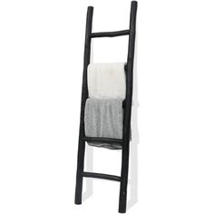 a wooden ladder with two towels hanging on it