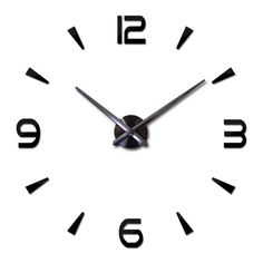 a large clock with black numbers on the face