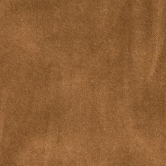 an image of a brown fabric textured with some sort of stain on the surface