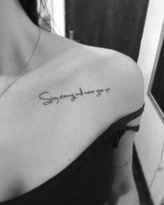 the back of a woman's shoulder that says stay strong, always on it