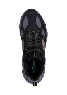 men's black sneakers with yellow laces