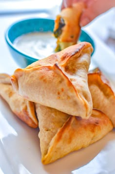 two pita breads stacked on top of each other with the title spinach fatayer