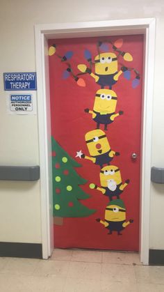 a door decorated to look like the characters from despicator therapy, with christmas trees and minion characters on it