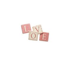 three pink and white tiles with the word love spelled in small letters on top of each other