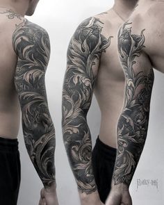 two men with different tattoos on their arms