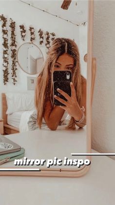 a woman taking a selfie in front of a mirror with the caption mirror pic inspo