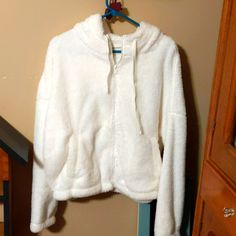 Nwt, Size L, Never Worn. This Hoodie Is A Cold Weather Style Staple. Pair With Jeans To Elevate Your Look. Drawstring Hood, Slightly Elasticized Casing At Bottom And On Sleeves, Two Slash Pockets. Given To Me As A Gift, But Was Too Big, My Loss Is Your Gain! White Fleece Outerwear With Drawstring Hood, White Fleece Outerwear For Loungewear, Comfy Cozy Fit White Outerwear, Comfy White Fall Outerwear, Trendy White Fleece Outerwear, White Outerwear With Drawstring Hood For Loungewear, White Casual Hoodie For Cold Weather, White Drawstring Hood Outerwear For Loungewear, Comfy White Winter Outerwear