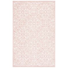 a pink rug with white flowers on it