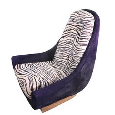 a purple and white zebra print chair