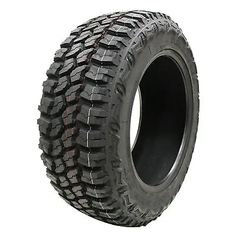 an all terrain tire on a white background