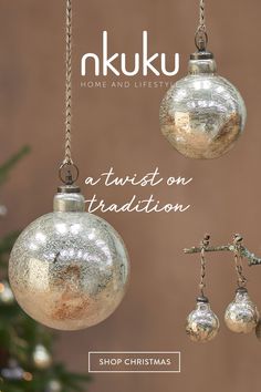 three ornaments hanging from a christmas tree with the words, akuku home and lifestyle