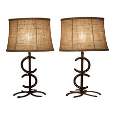 a pair of lamps sitting next to each other