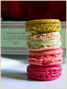 a stack of macaroons sitting on top of each other